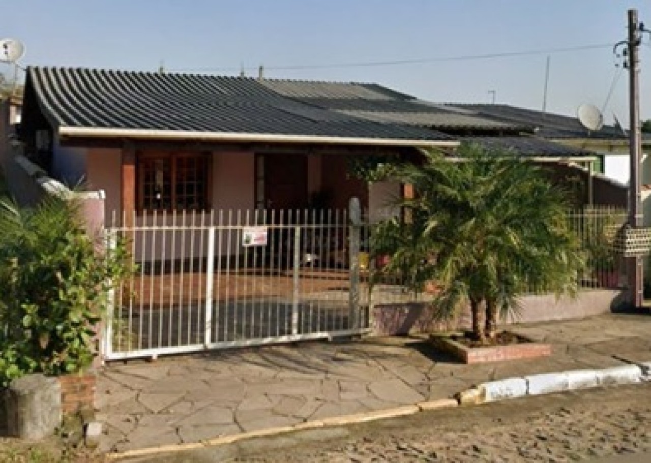 CASA SOB UM TERRENO DE TERRENO  COM 209,21m² EM SÃO SEBASTIÃO DO CAÍ