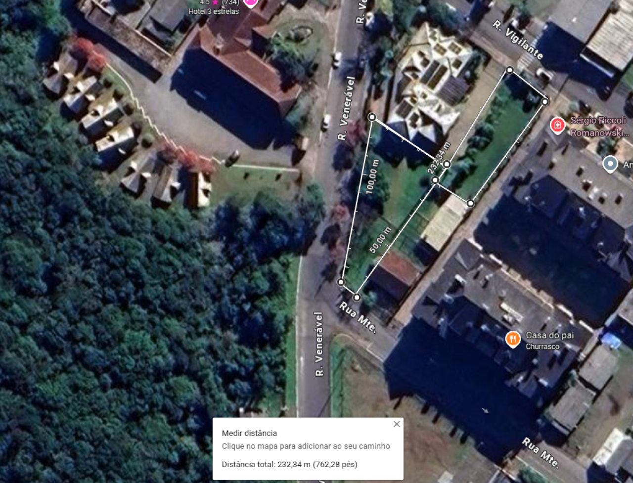 TERRENO COM 1.032,68m² COM BENFEITORIAS EM GRAMADO/RS (MAT. 542 E 1256 DO CRI DE GRAMADO)